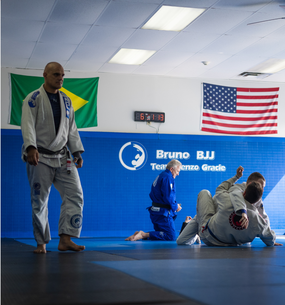 Instructor teaching an adult Brazilian Jiu-Jitsu class at Renzo Gracie Latham